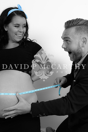 Loryn and Max laughing about the size of her bump